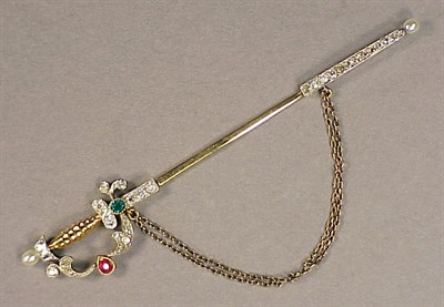 Lot 57 - Gold and Diamond Jabot Pin Yellow gold base...