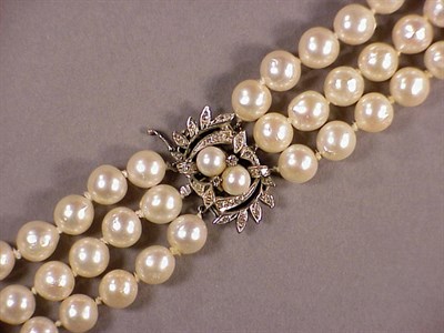Lot 557 - Cultured Pearl Necklace The triple strand...