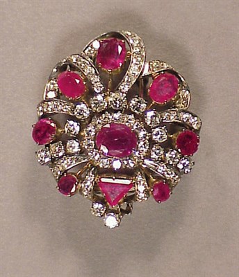 Lot 578 - Ruby and Diamond Brooch 14 kt. white and...