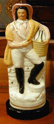 Lot 561 - Two Staffordshire Pottery Figural Lamps
