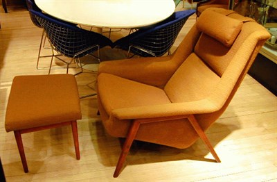 Lot 150 - Teak Upholstered Armchair and Footstool Folke...