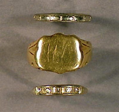 Lot 4 - Three Gold Rings Comprising two 14 kt. yellow...