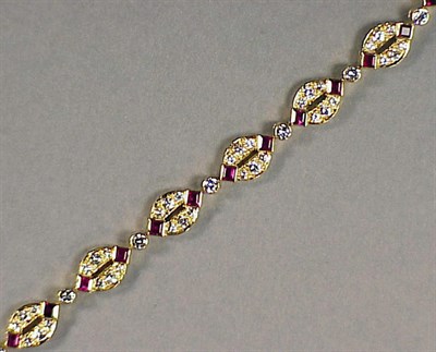 Lot 523 - Ruby and Diamond Bracelet 18 kt. yellow gold,...