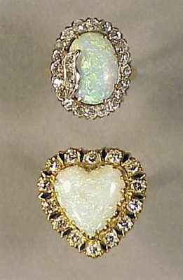 Lot 116 - Two Opal and Diamond Rings 14 kt. yellow and...
