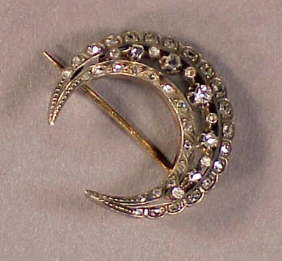 Lot 553 - Antique Style Diamond Crescent Pin Yellow gold...