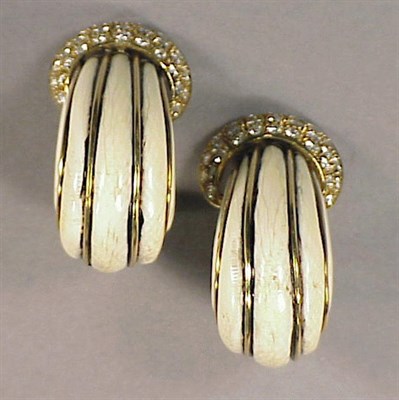 Lot 424 - Pair of Diamond and Ivory Earclips 18 kt....