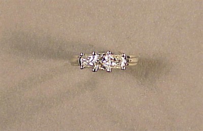 Lot 194 - Three Stone Diamond Ring Platinum, set across...