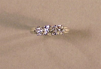 Lot 572 - Three Stone Diamond Ring Platinum, set across...