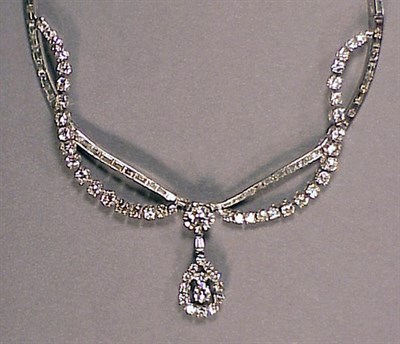 Lot 501 - Diamond Pendant Necklace Platinum, the...