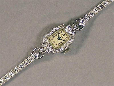 Lot 499 - Lady's Diamond Wristwatch The 14 kt. white...