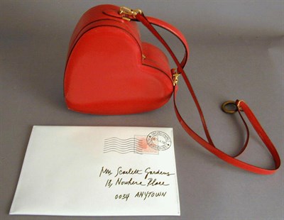 Lot 1124 - Moschino Heart and Love Letter Purses The...