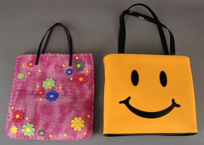 Lot 1123 - Two Happy Novelty Totes The first of taxi...
