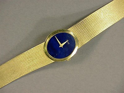 Lot 324 - Lady's Gold and Lapis Lazuli Wristwatch 18 kt....
