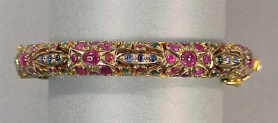 Lot 159 - Indian Gold and Multicolored Stone Bracelet...