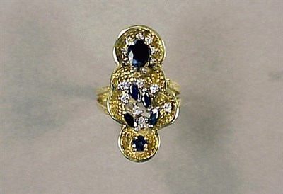 Lot 49 - Gold, Sapphire and Diamond Ring 14 kt. yellow...