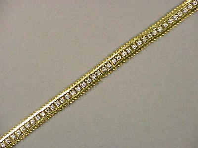 Lot 469 - Gold and Diamond Bracelet 14 kt. yellow gold,...