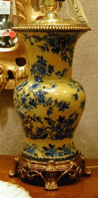 Lot 511 - Pair of Chinese Blue and Yellow Porcelain Lamps