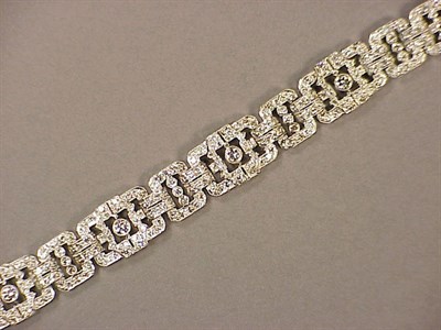 Lot 471 - Art Deco Style Gold and Diamond Bracelet 18 kt....