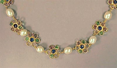 Lot 202 - Chanel Necklace The single strand of pale...