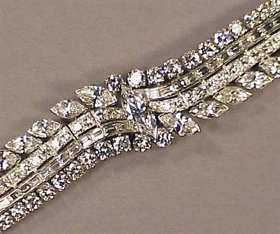 Lot 609 - Diamond Bracelet Platinum, set to the center...