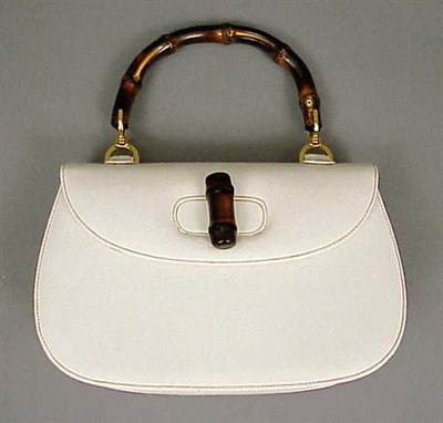 Lot 976 - Gucci White Bamboo Handle Handbag 1960s The...