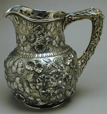 Lot 368 - S. Kirk & Sons Sterling Silver Pitcher Worked...