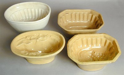 Lot 396 - Group of Four Yelloware Butter Molds...