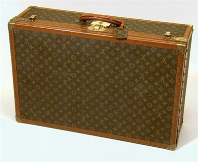 Lot 1211 - Louis Vuitton Suitcase 1970s Monogram canvas,...