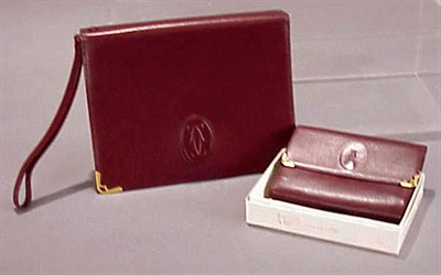 Lot 1090 - Cartier Burgundy Pochette and Wallet 1993 The...