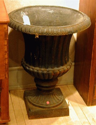 Lot 416 - Pair of Fluted Cast Iron Campana-Form Garden...
