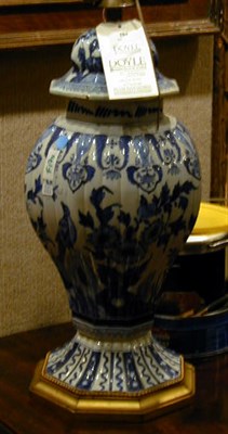 Lot 284 - Dutch Delft Covered Jar The baluster lobed...
