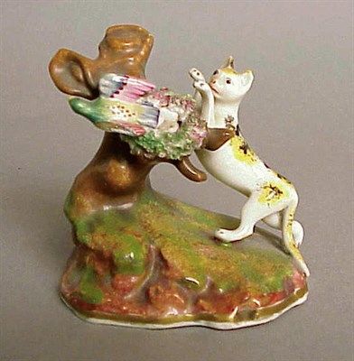 Lot 885 - Group of Ten Figures of Birds and Cats Height...