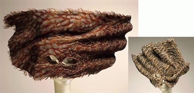 Lot 1288 - Two Bill Cunningham Brown Feather Masks Each...