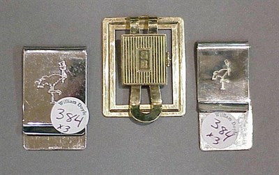 Lot 384 - Three Money Clips Comprising one 14 kt. gold...