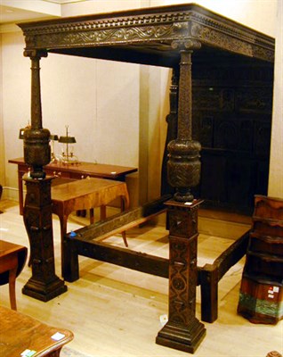 Lot 119 - Elizabethan Style Walnut Four-Poster Bed and a...