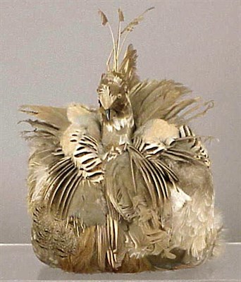 Lot 1305 - Bird-Form Feather Muff 1977 Of brown, gray and...