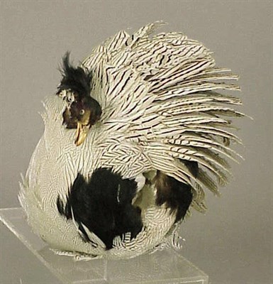 Lot 1302 - Bird-Form Feather Muff 1977 Of black and white...