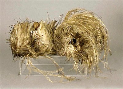 Lot 1299 - Two Feather Muffs 1977 Each of brown/gray...