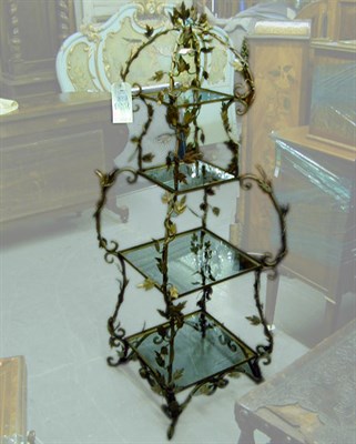 Lot 686 - Rococo Style Gilt-Metal Etagere With four...