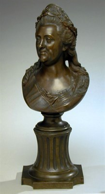 Lot 648 - Bronze Bust of a Woman Her hair set with a...