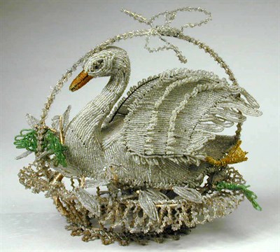 Lot 753 - Beaded Lamp In the form of a swan in a basket....