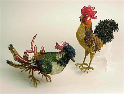 Lot 755 - Two Beaded Glass Figural Lamps Each in the...