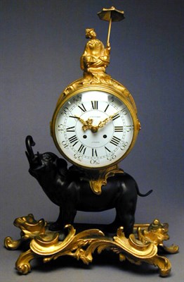 Lot 567 - Louis XV Style Gilt and Patinated-Bronze...
