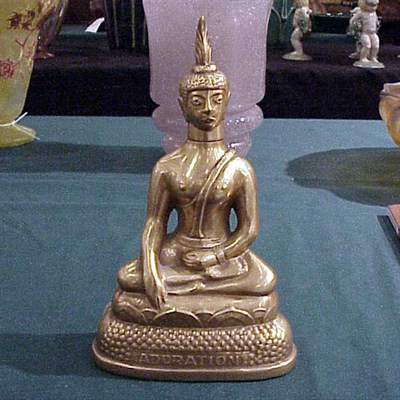 Lot 121 - Norman Adoration In the form of a seated...