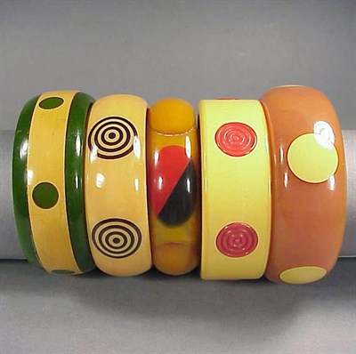 Lot 661 - Group of Five Bakelite Bracelets Each of...
