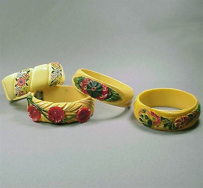 Lot 649 - Group of Four Bakelite Bracelets Each with...