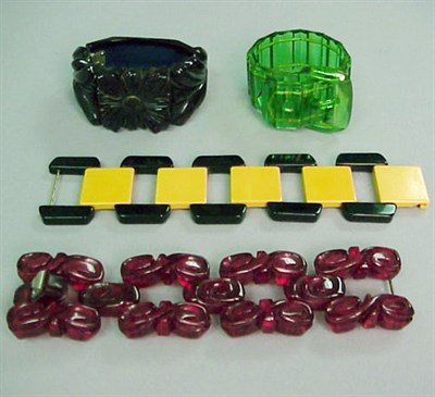 Lot 304 - Group of Four Bakelite Bracelets Comprising a...