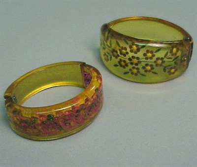 Lot 367 - Two Bakelite Reverse Carved and Painted Hinged...