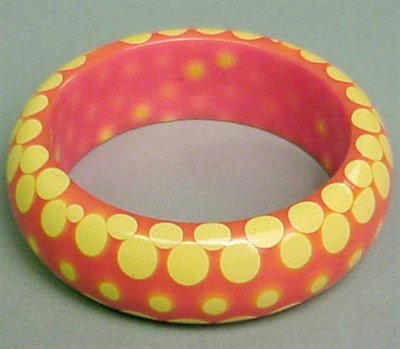 Lot 474 - Bakelite Random Dot Bracelet In orange with...