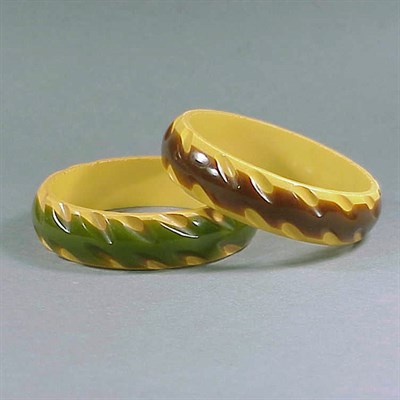 Lot 606 - Pair of Bakelite Two-Color Laminate Bracelets...